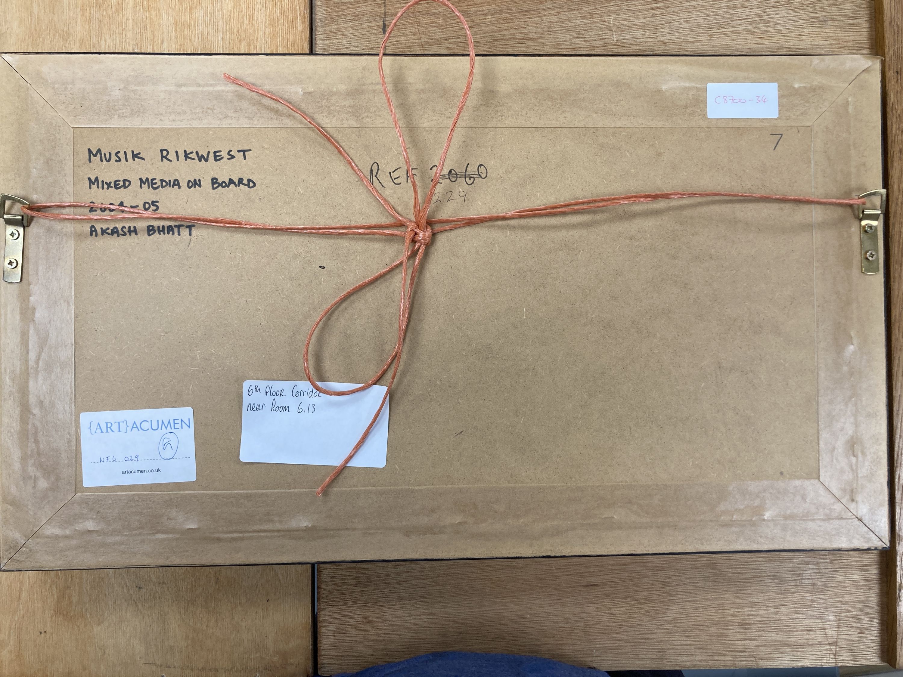 Akash Bhatt (1972-), mixed media on board, Musik Rikwest, inscribed verso and dated 2004/05, 20 x 49cm